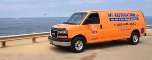 Water Damage Restoration Van Driving To Job Site