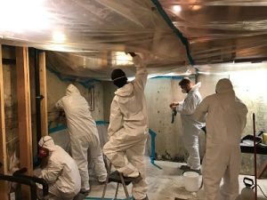 911 Mold Removal Crew Working On Site Long Island