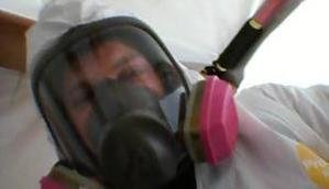 911 Water Damage Restoration Technician With Gas Mask Long Island