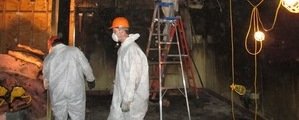 911 Water Damage Restoration Technician Working In Basement Long Island