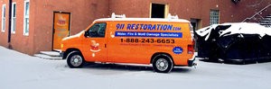 911 Water Damage Restoration Van At Snowy Civic Job Site Long Island